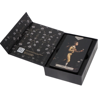 Baroque-inspired tarot cards from The Divine Artisan Tarot with dark green packaging