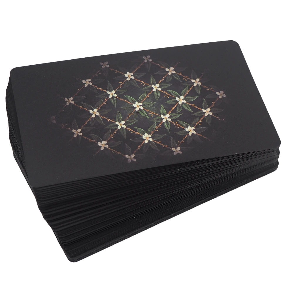 Dark green tarot card box and illustrated cards from The Divine Artisan Tarot deck